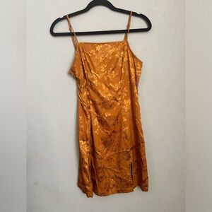Short dress color gold/orange Size Medium.
